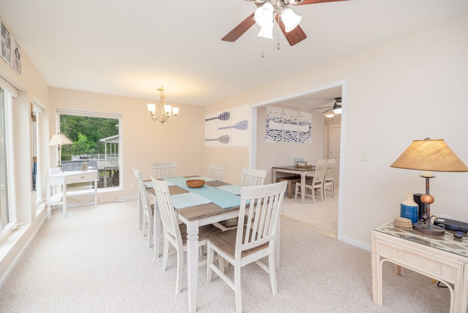 The dining area provides a picturesque view of the lake.