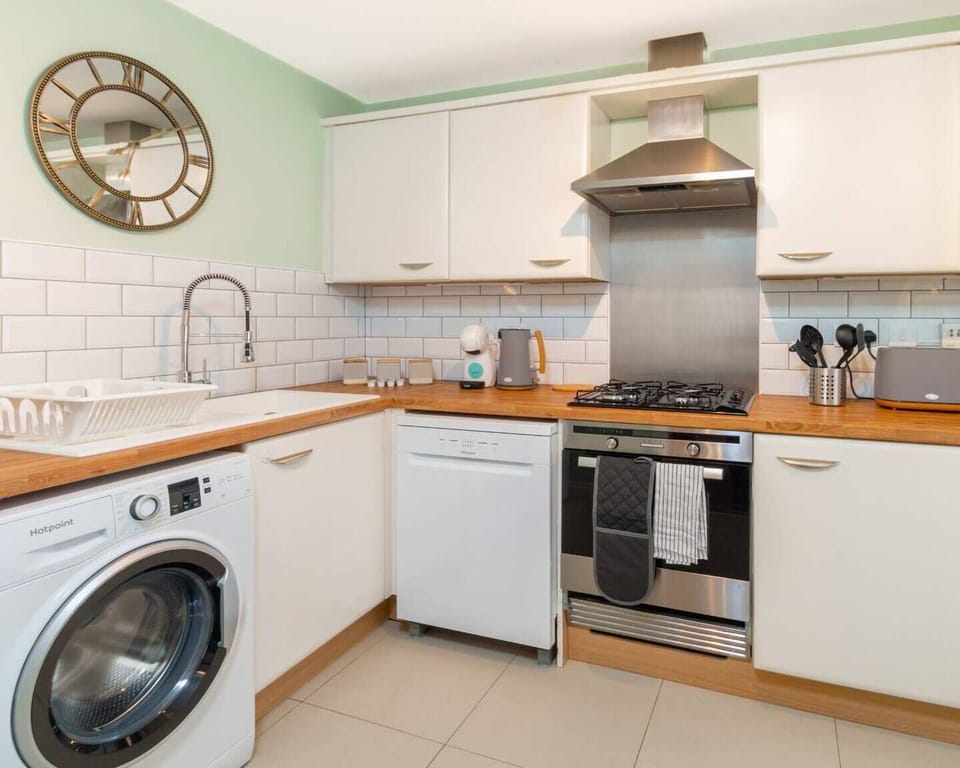 Fully equipped kitchen. Prepare meals easily during your stay.