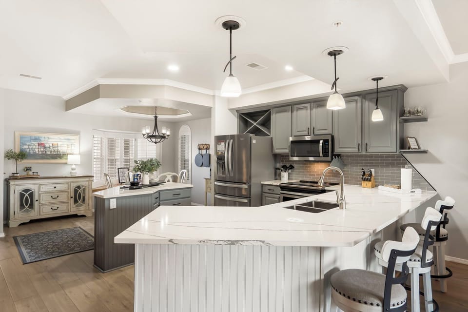 Full Kitchen with Upgraded Appliances and Extra Bar Seating