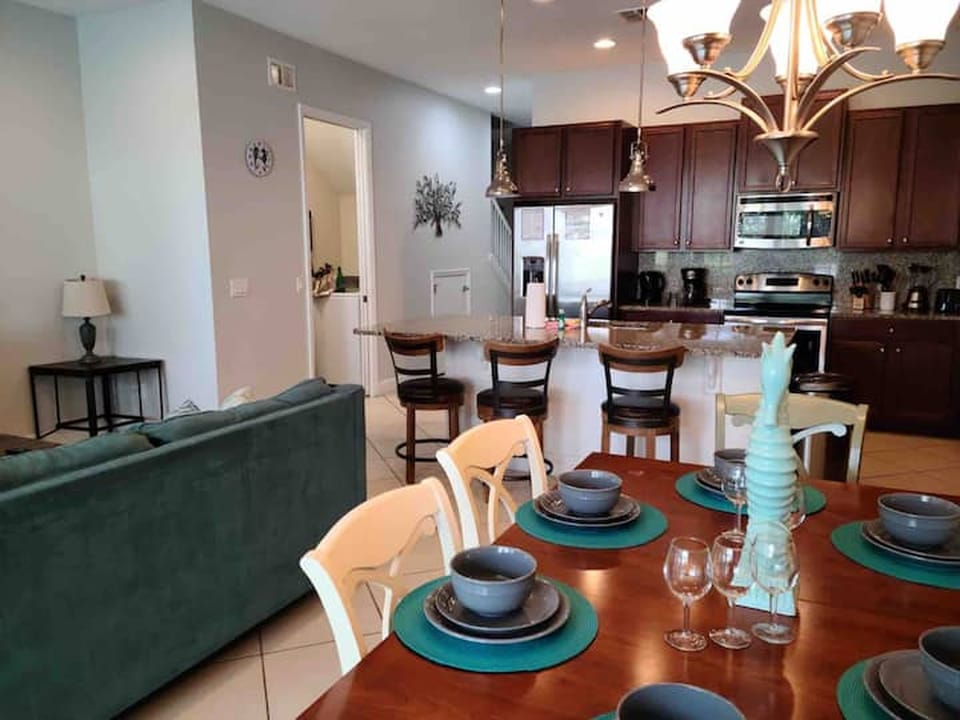 Savor the moment in this beautifully set dining space.

