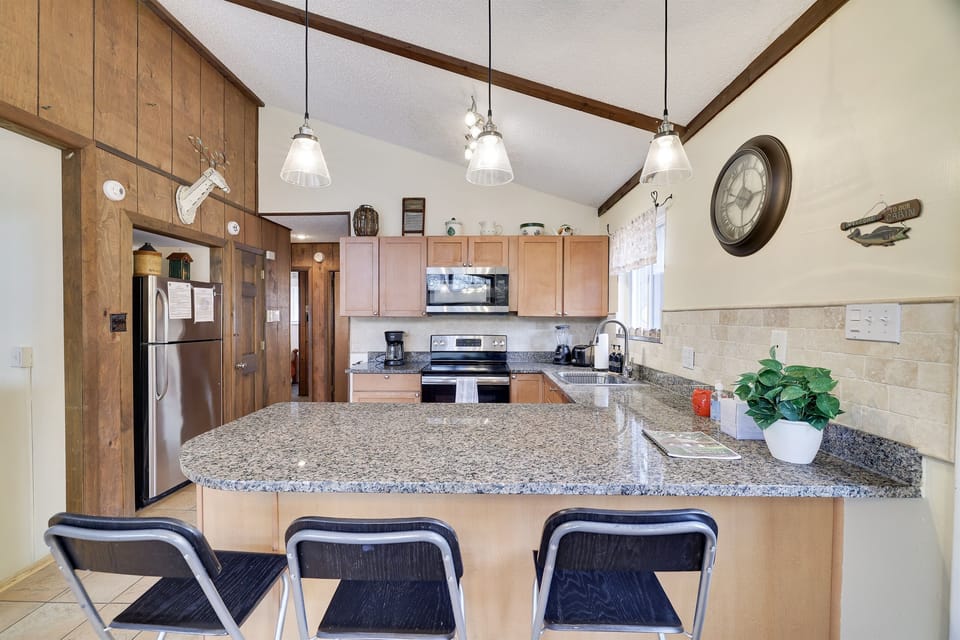 Fully equipped kitchen. Eat in counter space. Lots of room to cook! 