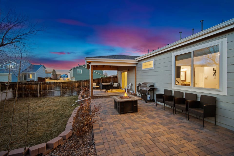 You will love the large back yard with a grill a propane fire pit.