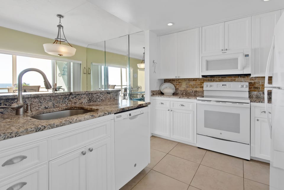Open kitchen with granite counters