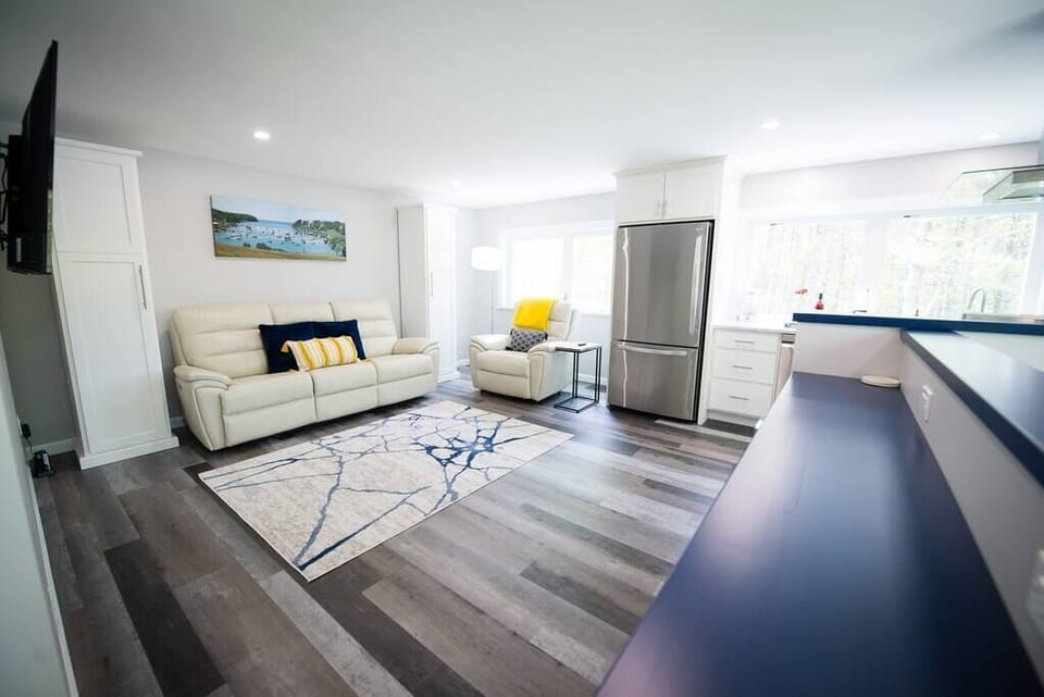Open concept living space/kitchen/eat-in bar