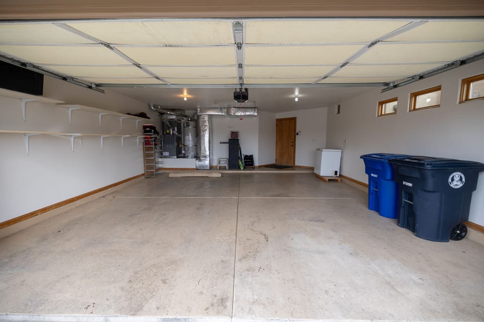 2 car garage. 2 driveway parking spaces. Street parking as well.