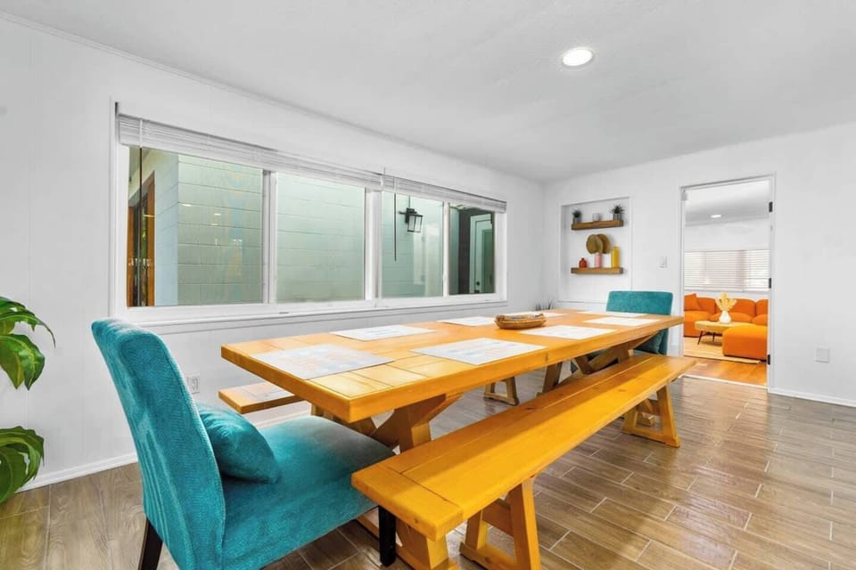 Our custom-made 10-ft dining room table will seat your entire group. 