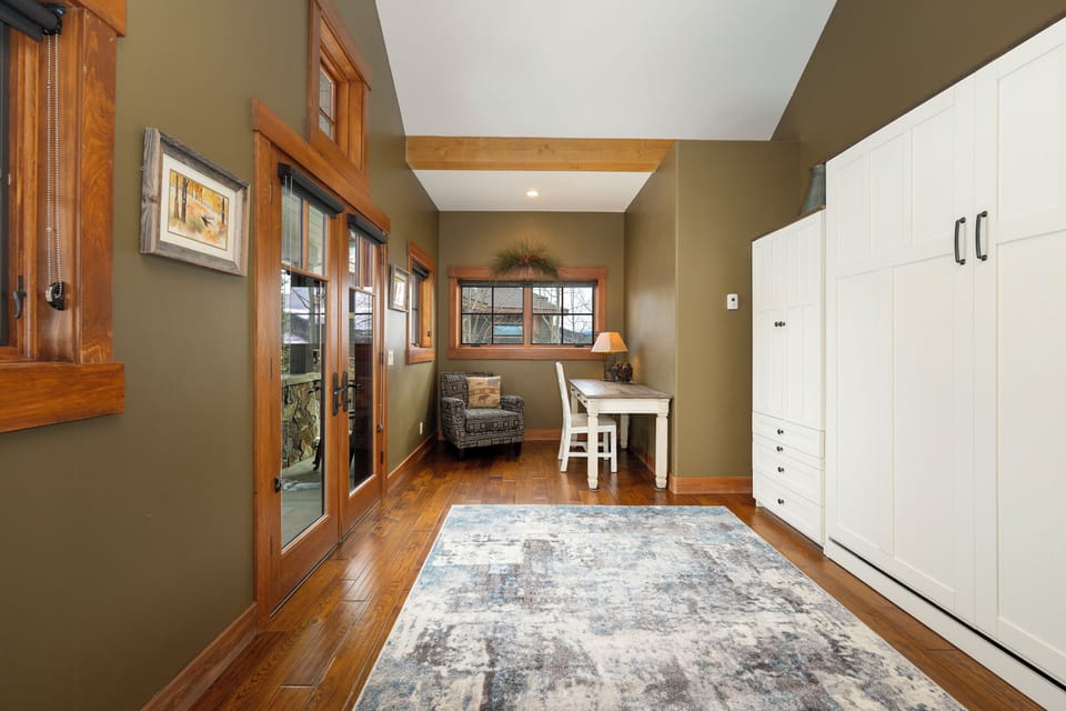 Main level Bedroom/Office  space with queen size murphy bed.
