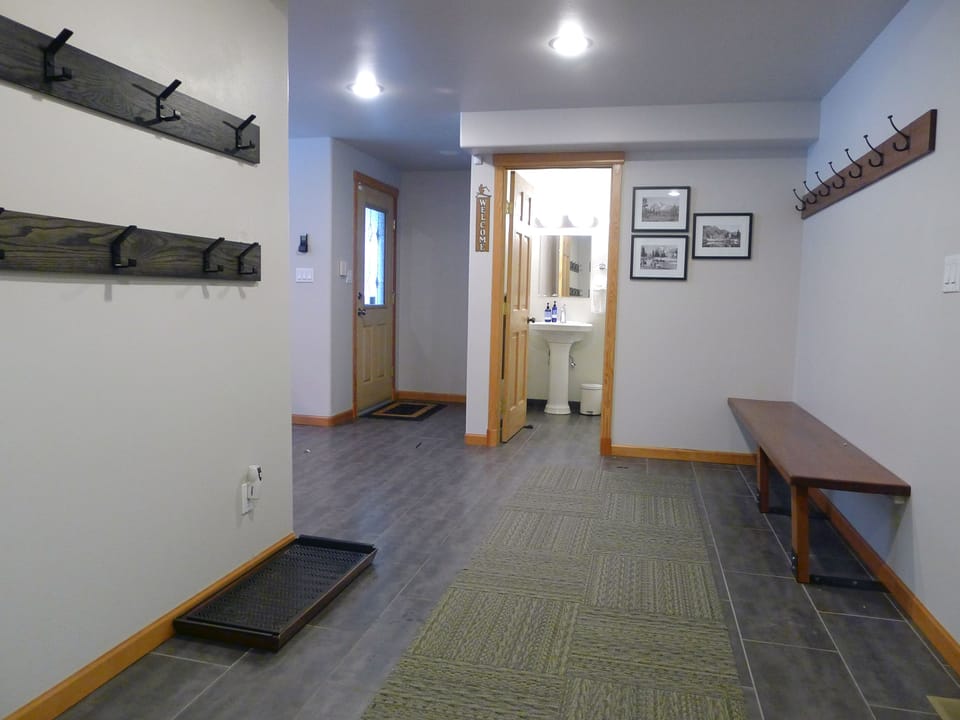 Come in after a fun outing, get clean and get organized. Hooks abound!