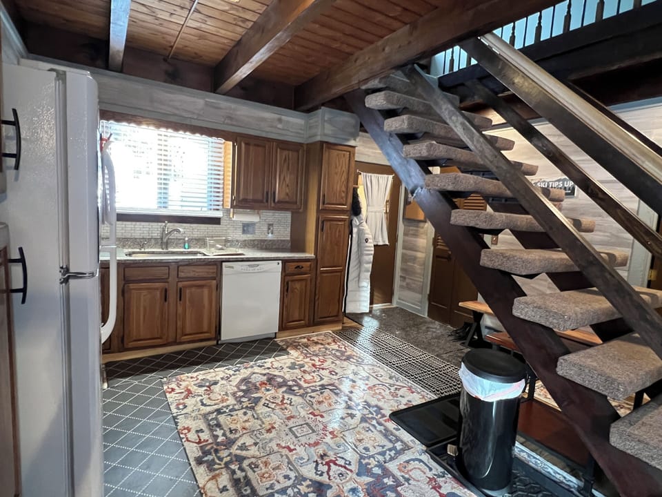 Enter into hall and open kitchen for easy unloading
