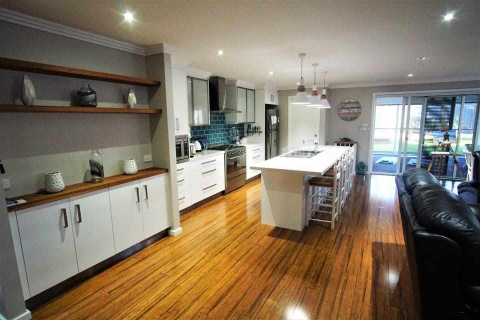 Spotless and well equipped open plan kitchen and dining