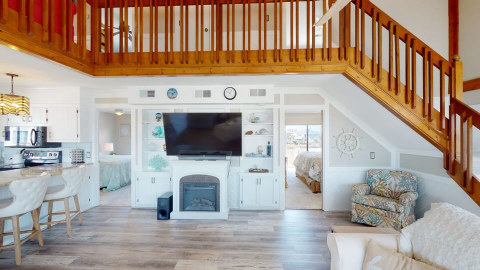 Fresh white interiors and airy design create a calm, upscale beach atmosphere just minutes from the shores of Myrtle Beach.