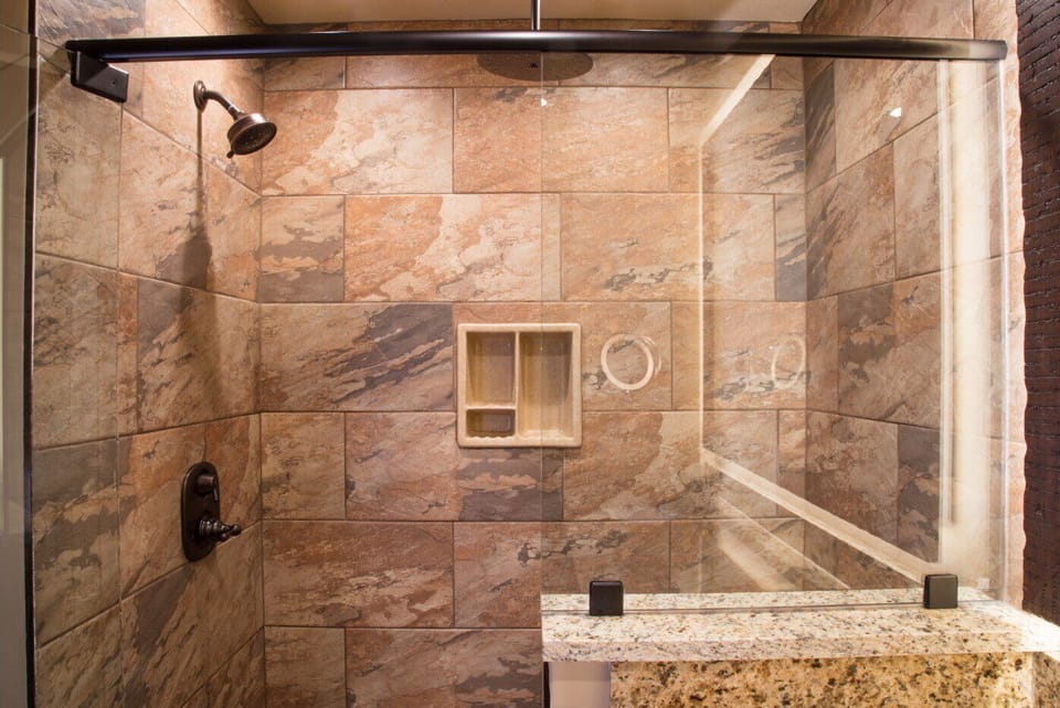 All bathrooms have a shower like this.