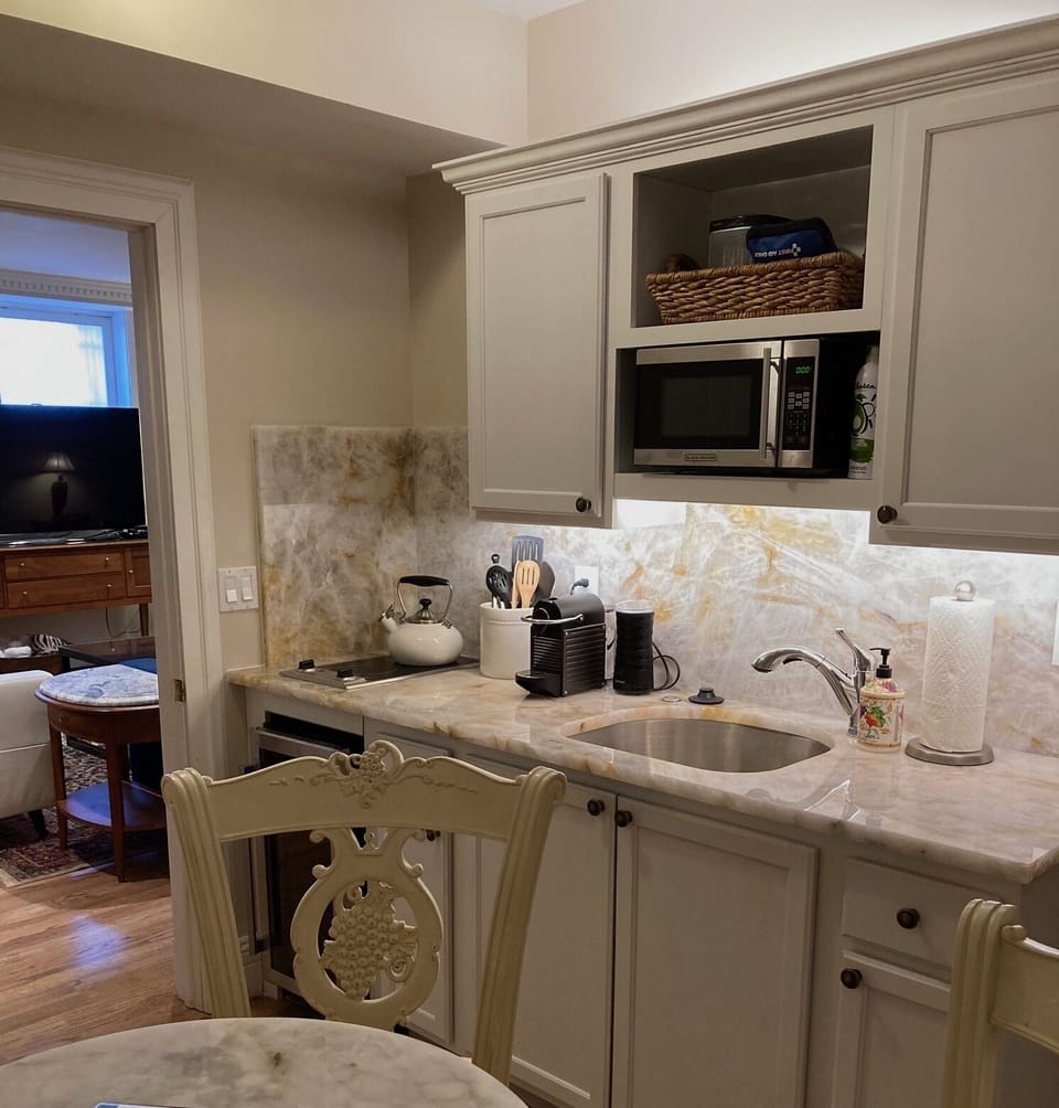Eat-in kitchen w/ all the essentials including a 2-burner electric cooktop!