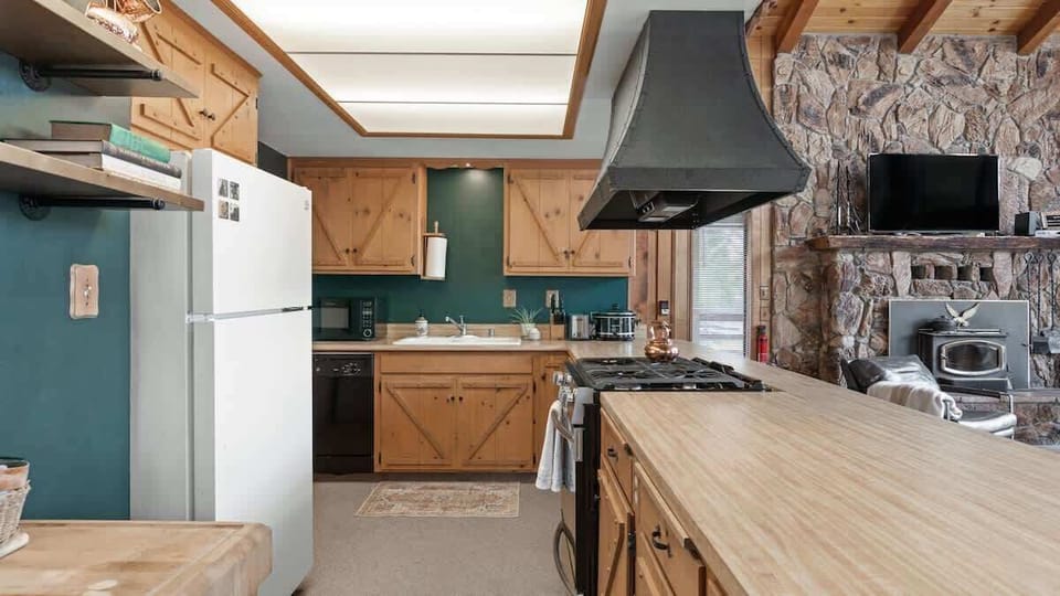 Kitchen has gas stove and everything you'll need to cook a meal