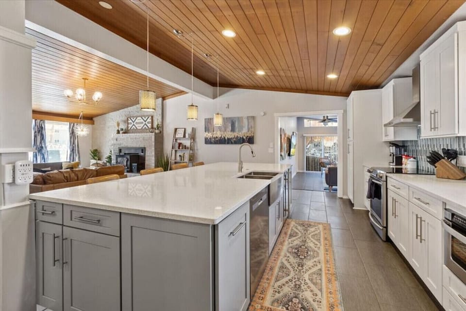 Large kitchen with oversized island so you can make meals and memories around the dinner table!