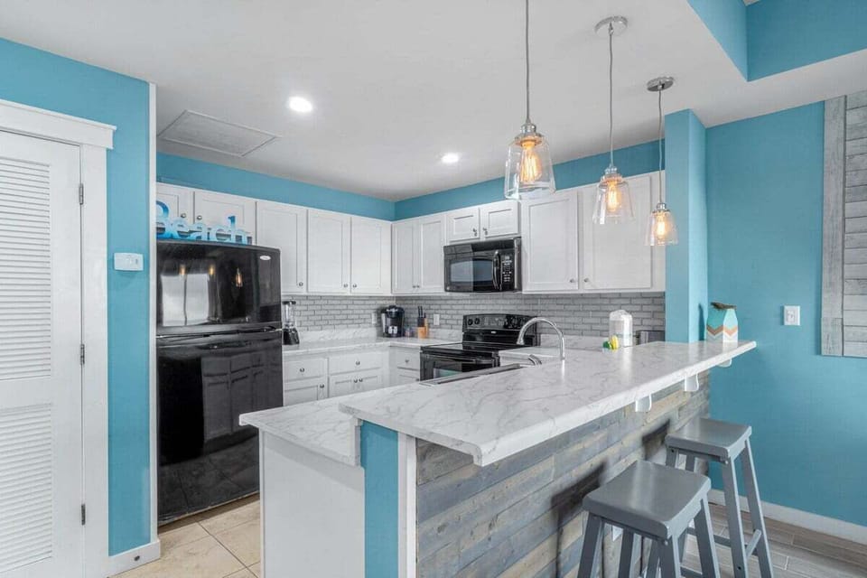 Kitchen area with bar seating