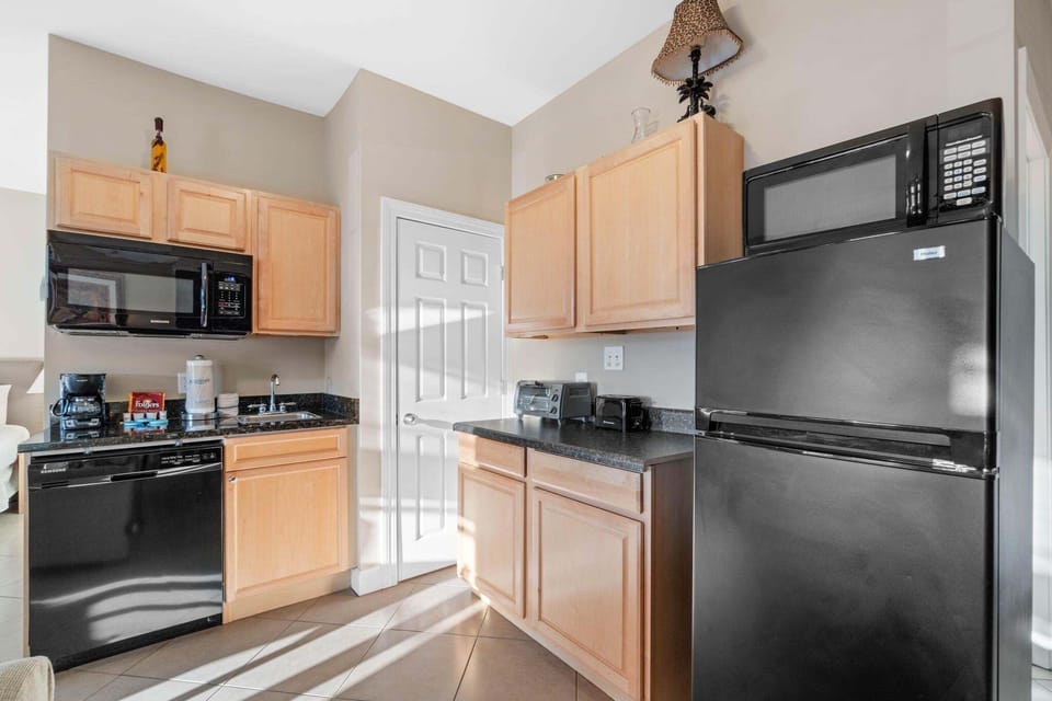 Fully applianced kitchenette with all the cooking essentials + coffee essentials