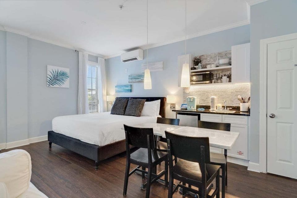 King size bed and dining area