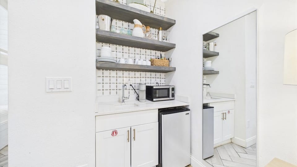 Kitchenette with microwave and under counter refrigerator