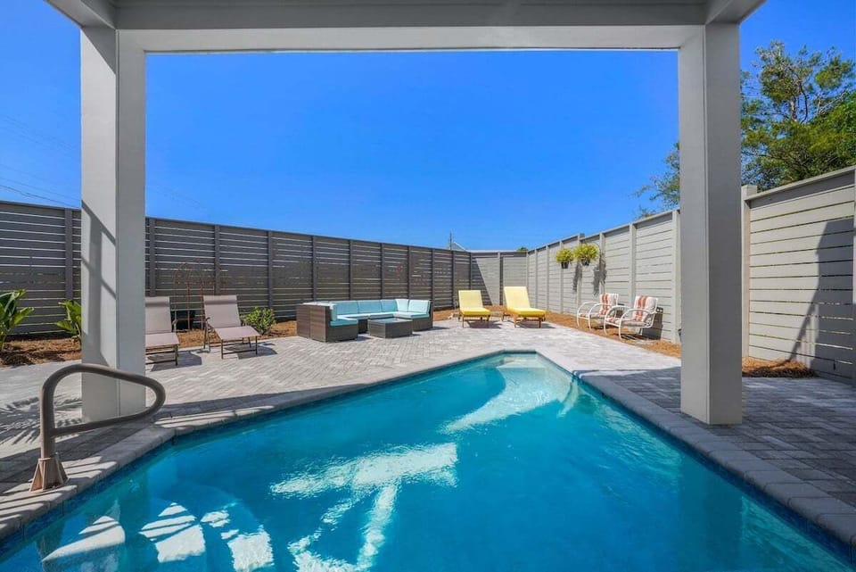 Pool and fenced back yard