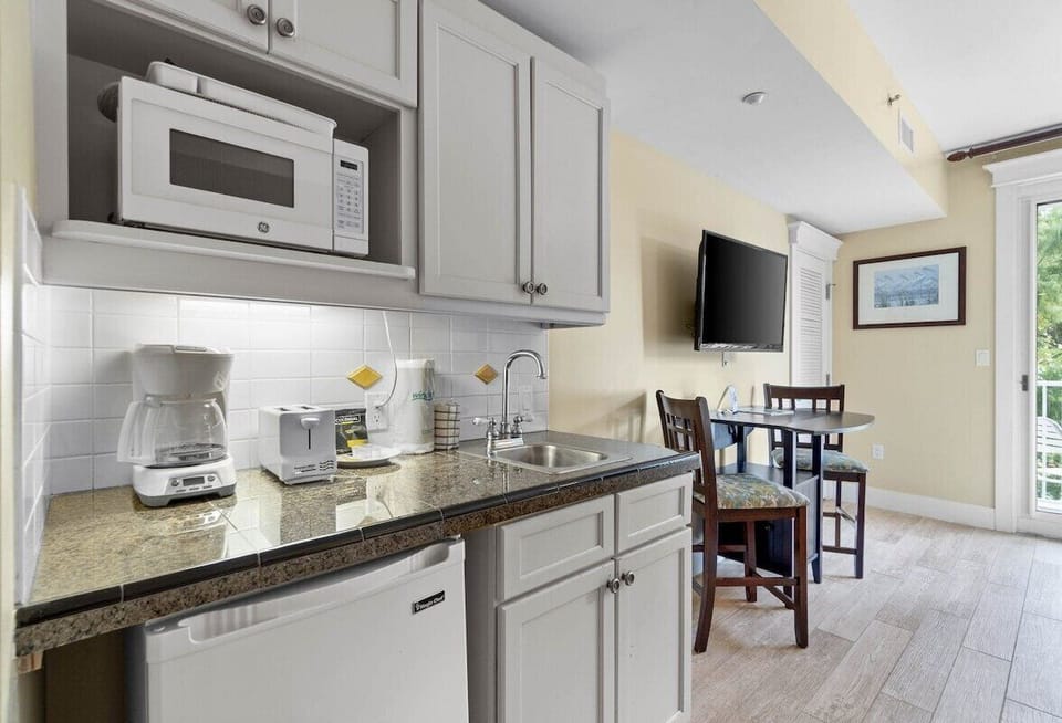 Kitchenette with coffee maker and toaster