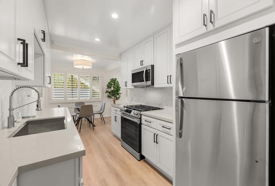 Kitchen with full size Fridge 