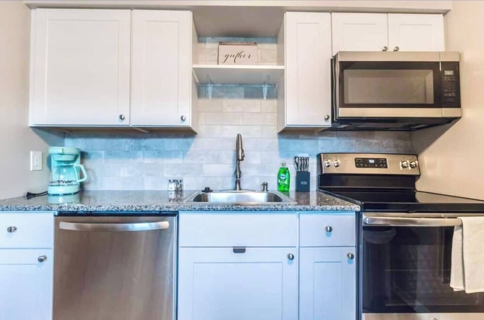 Clean, Bright, and Inviting: Step into our white kitchen. ️