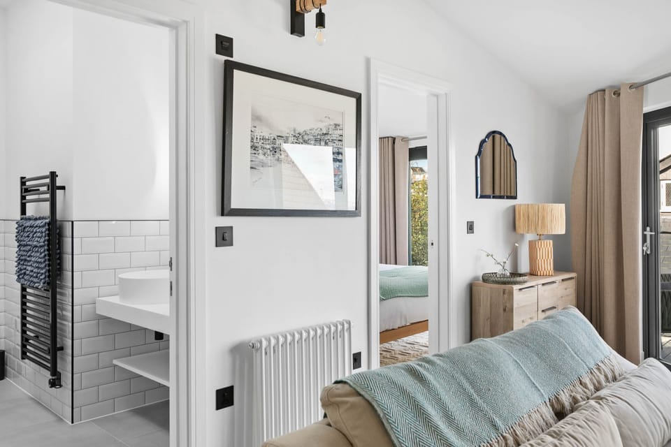 Bathroom and bedroom door from the living area - The Sail Loft Suite