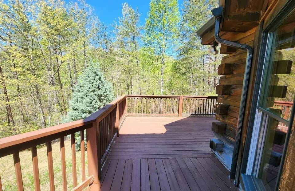 wrap around deck with seating and grill