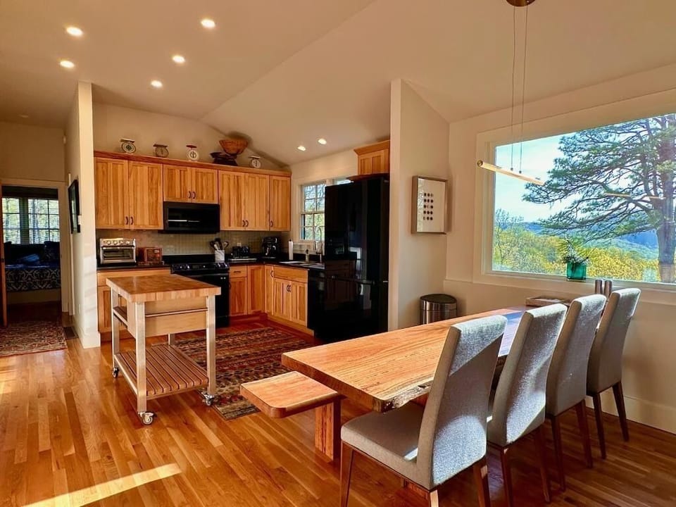 Kitchen with Butcher Block Island and Dining Area