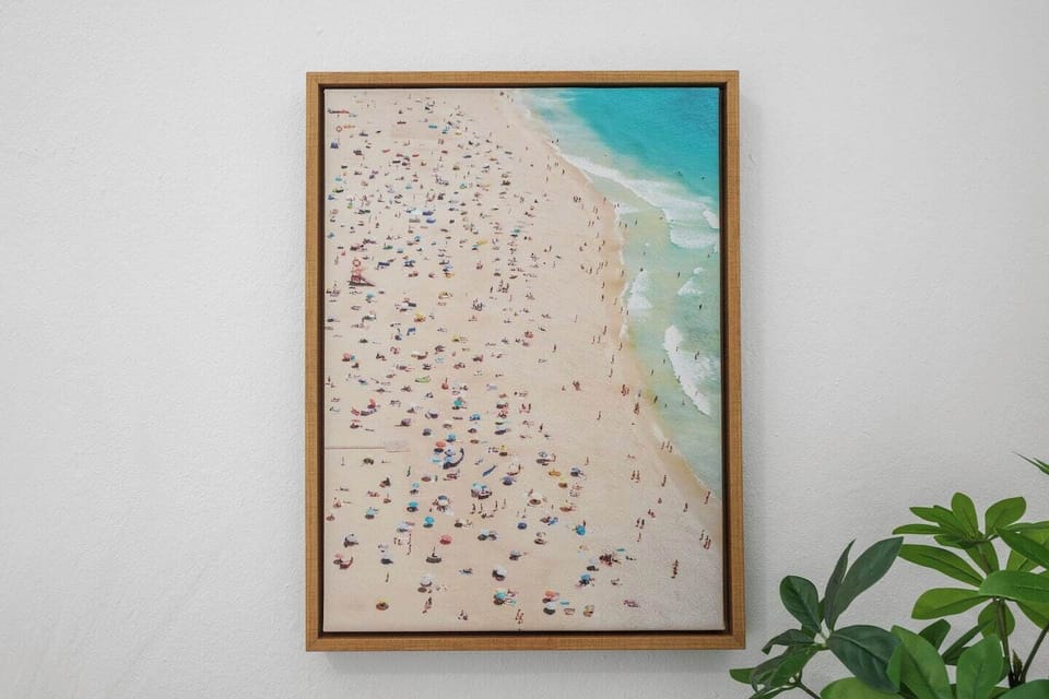 Unwind in a bright and airy living space, adorned with contemporary art pieces that add character to the room.