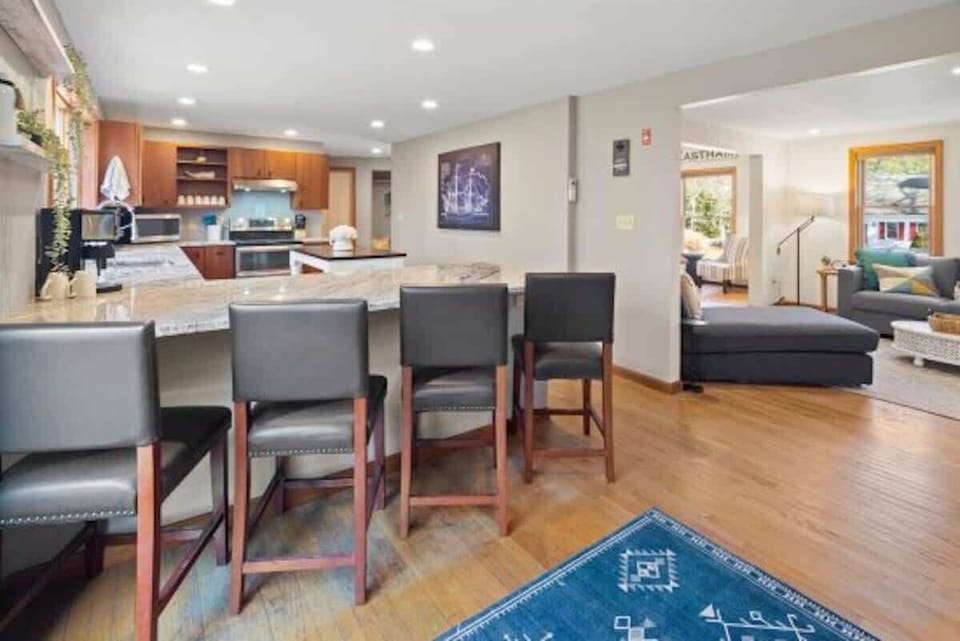 Open and airy 1st floor living spaces with easy access to the kitchen, family room and dining room