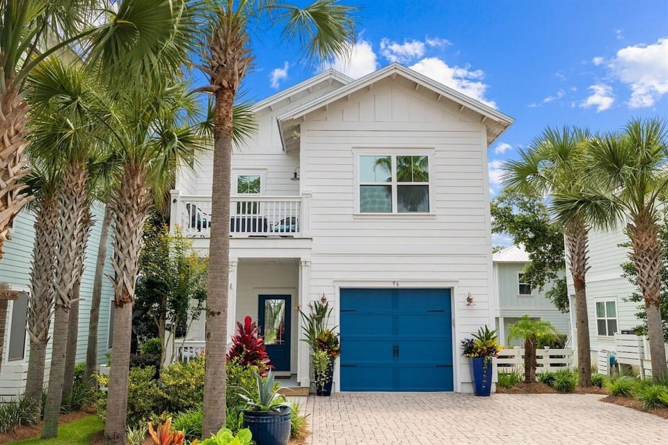 A stunning coastal retreat with modern architecture and a welcoming blue door