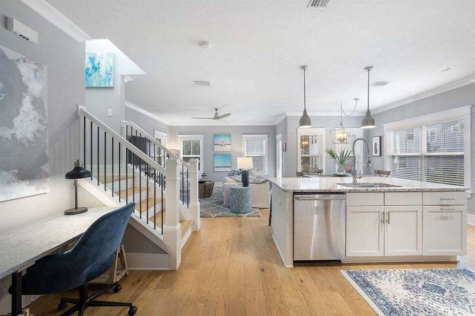 The kitchen island keeps you invited to the living space.