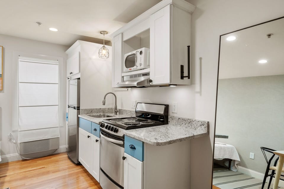 Kitchen with essentials. Glassware, utensils, baking sheets, cutting boards, and more. (2)