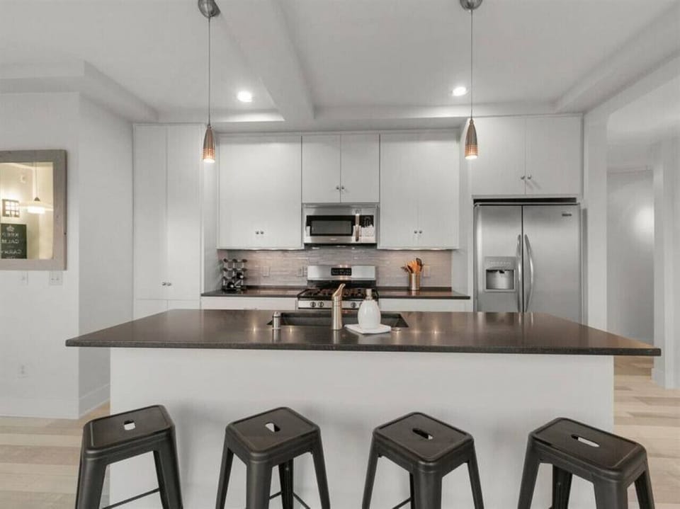 Start your day at the stylish breakfast bar—perfect for morning coffee or a quick bite before exploring Milwaukee ☕