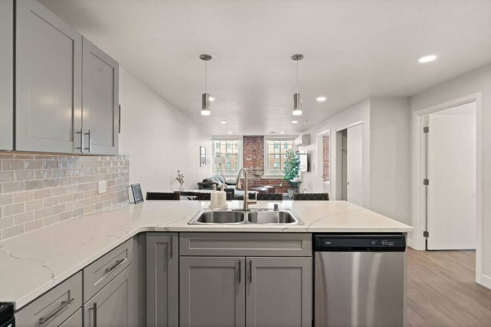 Open-concept design with quartz countertops and hand-picked finishes.