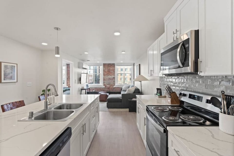 Open-concept design with quartz countertops and hand-picked finishes.