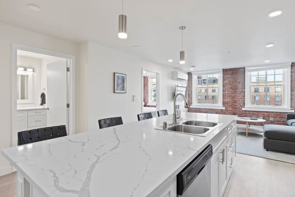 Bright, airy kitchen with plenty of counter space.