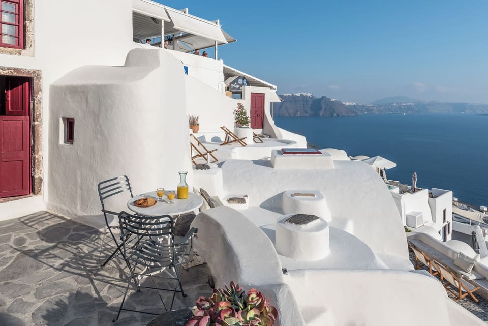 Sip sunrise coffee on your private terrace above the sea.