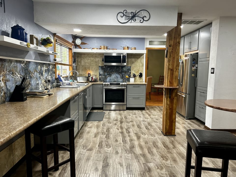 Kitchen is big. All u need is here to eat drink & be merry - Cheers