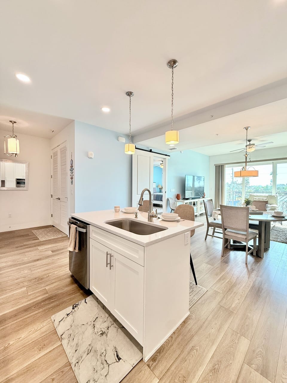 Stainless-steel appliances, 2 bar stools, new cookware, and more amenities, 