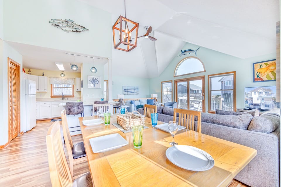An expansive dining table with ample seating, ideal for hosting large gatherings and creating memorable meals.