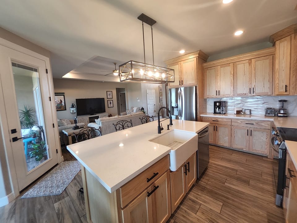 Filtered water system at refrigerator for fresh drinking & ice, open floor plan