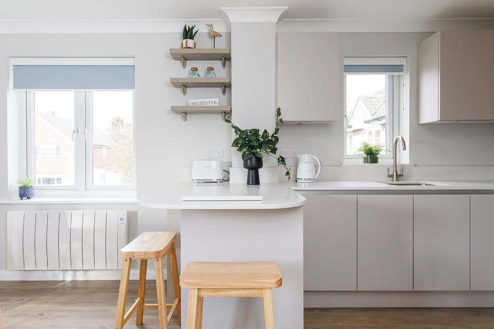 breakfast bar seating area and kitchen. 