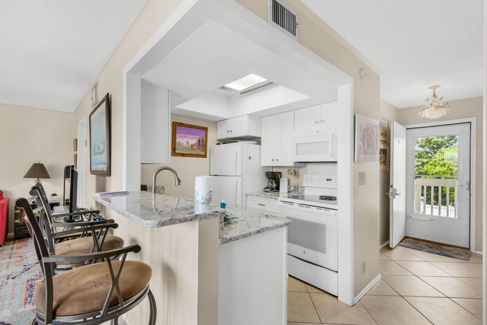 Kitchen with eat-in bar