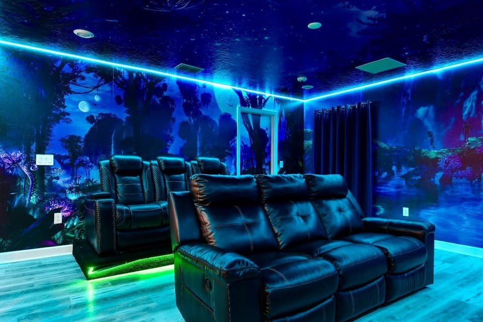 Immerse in a stunning Avatar-themed theater with LED lighting and plush seating.