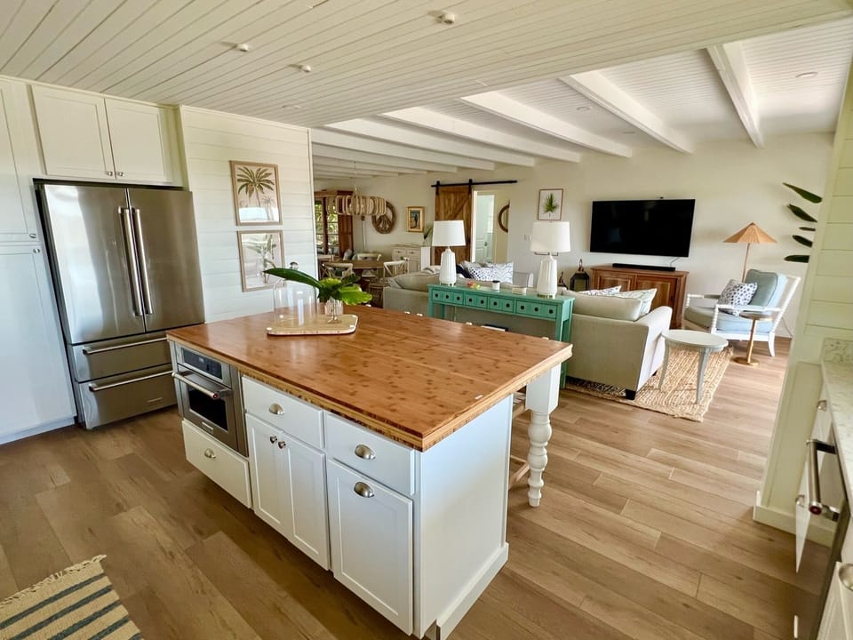 Open concept chef's kitchen. Equipped with luxury appliances 