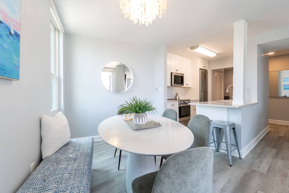 The dining room table easily seats up to 6 guests in the cleverly-designed layout.