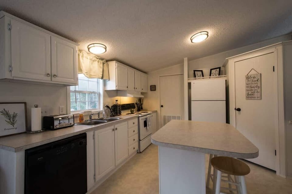 Cook your favorite dishes in this  Kitchen Fully Stocked with all the basics.